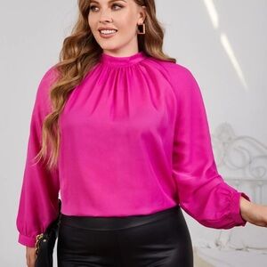 Hot pink blouse.